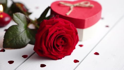 Red Rose and Heart Gift on White Wood