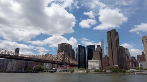 View of Manhattan from Roosevelt Island with East River and Queensboro 59th Street Ed Koch Bridge.