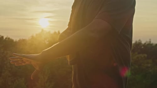 Sunset Mosquito Protection Man Sprays Repellent on Mountain