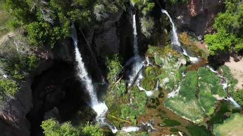 Rifle Falls State Park, Colorado USA. Drone Aerial View of Waterfalls and Green Landscape on Sunny D