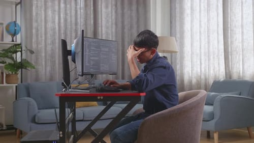Asian Boy Programmer Having A Headache Creating Software Engineer Developing App, Program