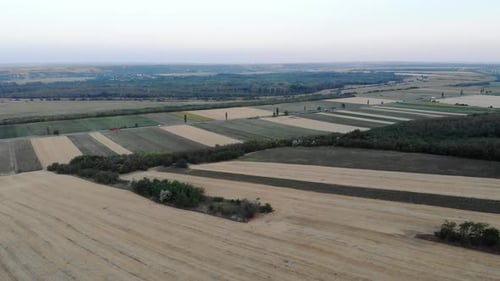 Aerial Panorama Of Farmlands With Country Road.