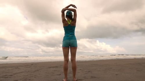 Sporty Woman Exercising, Stretching Arms On Beach, Super Slow Motion 240fps