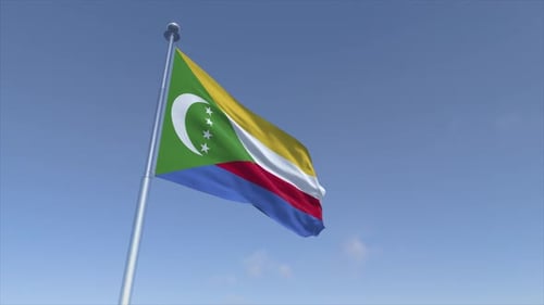 Comoros National Flag Waving in Realistic Blue Sky