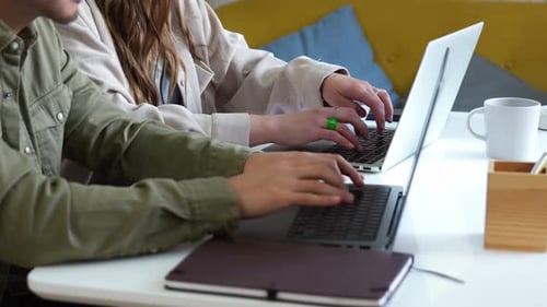 Typing on Laptops at a Desk