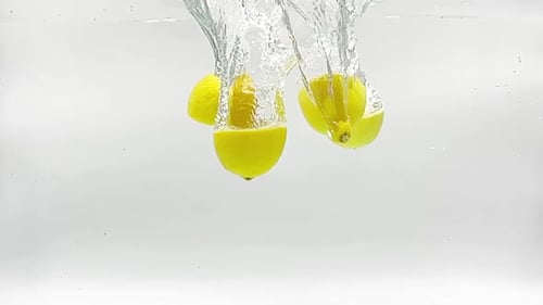 Lemon Falling in Water