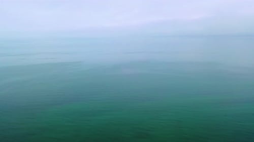 Drone Footage of Storm Clouds Moving Over Dark Ocean Waters