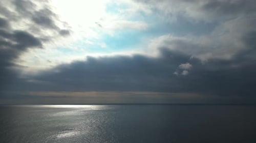Aerial shot of the ocean and sky