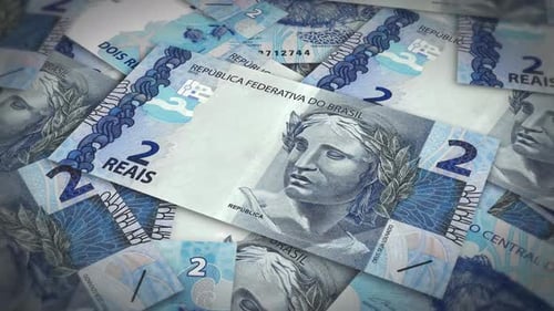 Pile of brazil real cash money, inflation concept. Closeup new brazil two real bills