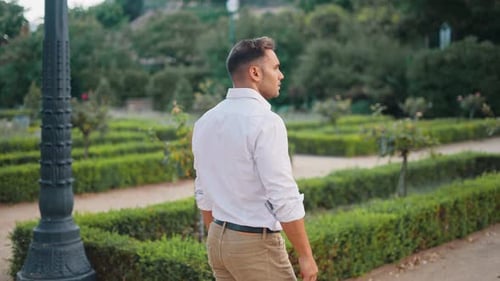 Male Manager Walking in Park