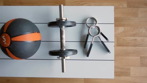 Gym Equipment or Dumbbell Kettlebell in a Gym Bench