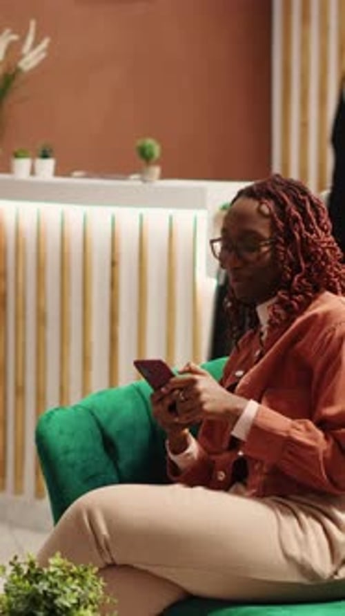 Vertical Video Newlywed Couple Waiting in Hotel Lobby
