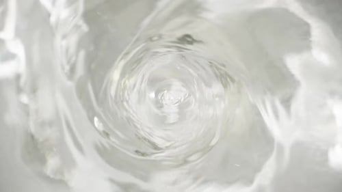 Whirlpool, funnel. Rotation underwater. slider close up inside. Slow motion