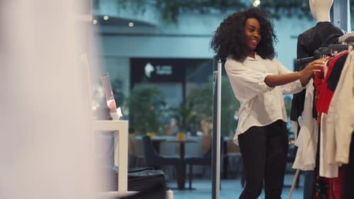 Beautiful African American Woman Choose Dress at Clothing Store Smile Fashion Girl Fitness