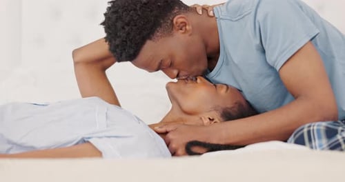 Loving Couple Embrace in Bed, Kissing