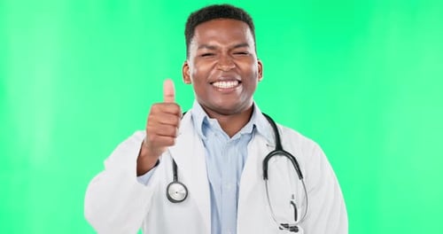Face, doctor and black man with thumbs up on green screen in studio isolated on background