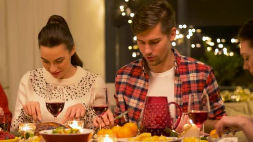 Friends Enjoying a Festive Holiday Dinner Celebration
