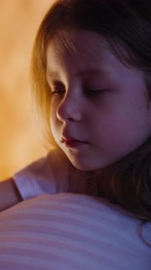 Sad Girl Cries Suffering From Loneliness on Bed at Night