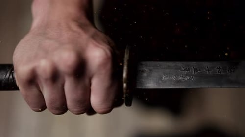 A Traditional Sword With Japanese Inscriptions