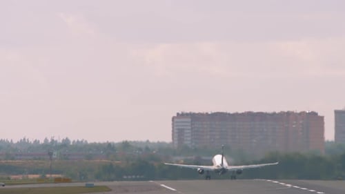 Passenger Plane Taking Off From Runway