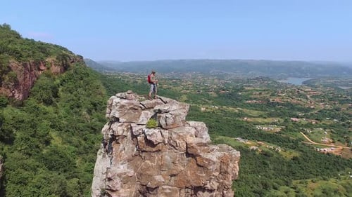 Drone Rotating of Young Free Climber and Hiker, Climbing Mountain