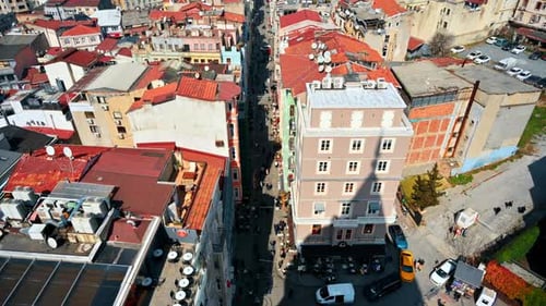 Cityscape of Istanbul, Turkey. Multiple residential buildings, narrow streets, Bosporus strait with
