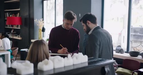 Group of Young Professional Genz Business People Cooperate Sharing Ideas at Trendy Loft Light Office