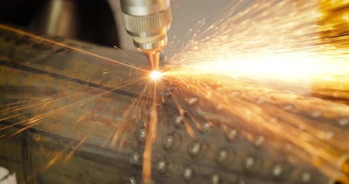 CNC Laser and gas cutting of metal, modern industrial technology.