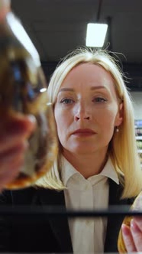 Blonde Woman Grocery Shopping Close Up in Portrait