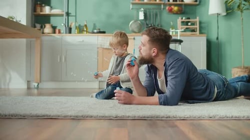 A Cheerful Father With Adorable Son Spent Time Together at Home