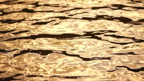 Sun Reflecting on Sparkling Sea Lake Water Surface Ocean at Sunset Sunrise Sunrays Flickering in