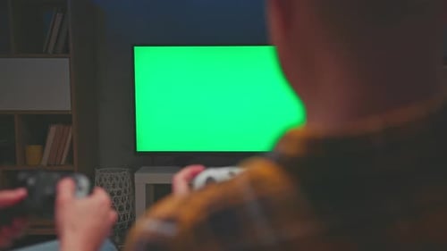 Green Screen for Chroma Key of People Playing Video Game on Console Controllers
