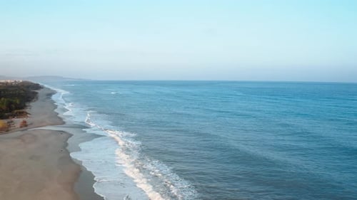 Ocean Waves Crash in Winter Season on the Beach Aerial