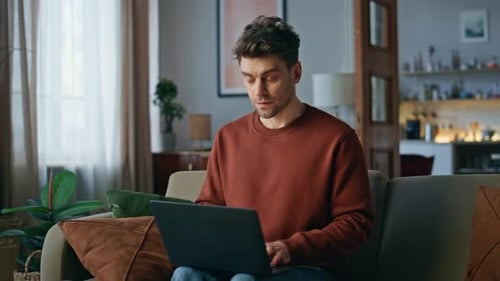 Serious Online Manager Working at Laptop Home Close Up Smart Freelancer Typing