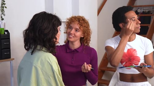 Friends Doing Makeup Indoors During Daytime
