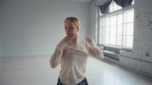 Girl Performing Contemporary Moves on Camera in Dance Studio