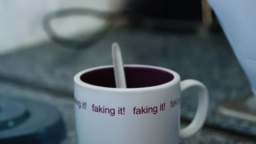 Filling Mug with Hot Water for Coffee