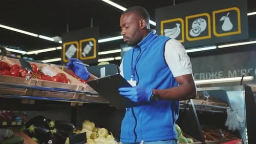 Young African American Sales Consultant Working in Supermarket Market Happy Store Black Food Seller