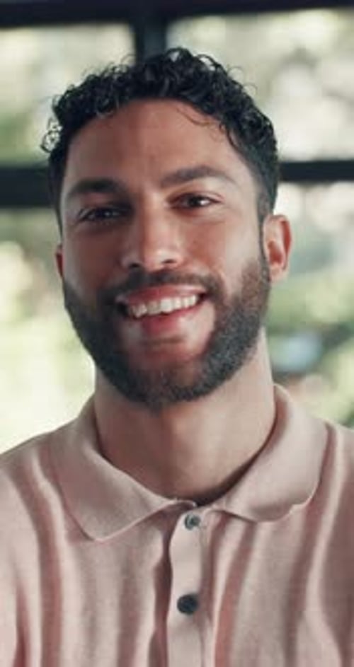 Smiling Young Man in Polo Shirt Portrait