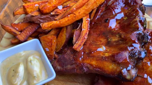 Delicious BBQ Ribs with Sweet Potato Fries and Slaw