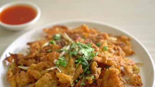 Crispy fried mussel pancake with egg - Thai street food style