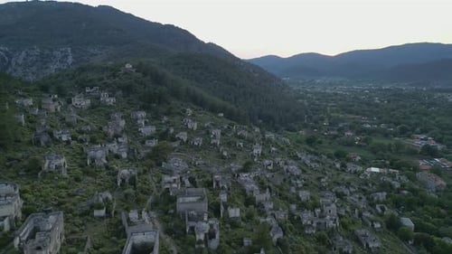 Kayakoy Ghost Town in Turkey Seen While Rising Into Sunset