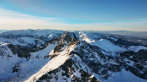 Majestic aerial views of the snow-capped Alps showcasing stunning landscapes