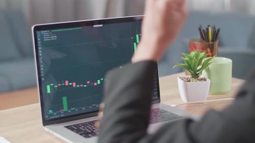 Close Up Of Asian Businesswoman Being Happy After Seeing Uptrend In The Trading On Computer Screen