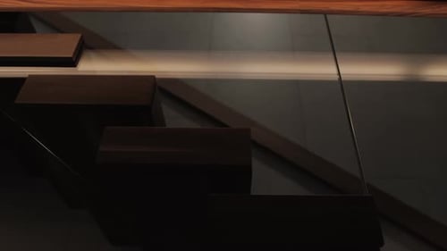 Modern Staircases Combine Elegant Lighting and Glass Railings Creating a Stunning Focal Point