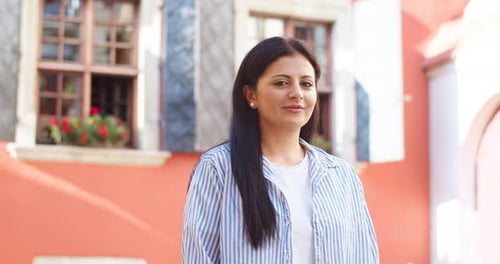 Goodlooking Female in Cotton Shirt Standing on Street Near House Adult Caucasian Woman Turning to