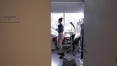 Ballerina And Fashion Designer Preparing Tutu In Wardrobe Studio Slow Motion