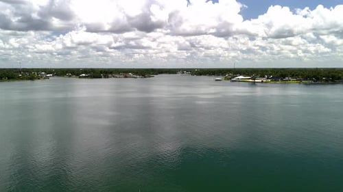 Sailboat During Cloudy Day Near Panama City In The Bay County, Florida, United States. Aerial Drone