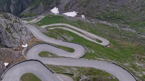 Hairpin Turns on Stone-Paved Alpine Road, Swiss Summer