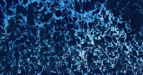 Aerial Drone View Over Sea or Ocean with Beautiful Waves Pattern and Sea Foam Landscapes View of